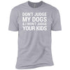 Don't Judge My Dogs And I Won't Judge Your Kids Premium Tee