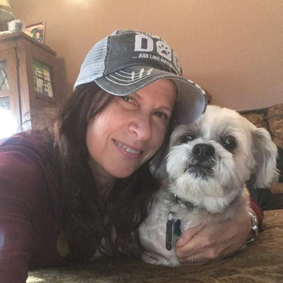 ALL I CARE ABOUT IS MY DOG AND LIKE MAYBE 3 PEOPLE DISTRESSED TRUCKER CAP