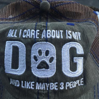 ALL I CARE ABOUT IS MY DOG AND LIKE MAYBE 3 PEOPLE DISTRESSED TRUCKER CAP