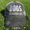 DOGS BECAUSE PEOPLE SUCK DISTRESSED TRUCKER CAP